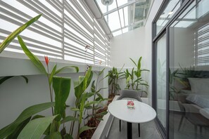 Deluxe Double Room, City View | Terrace/patio