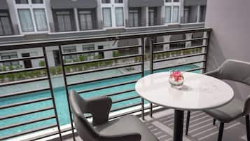 Deluxe Double Room, Balcony, Pool View | Terrace/patio