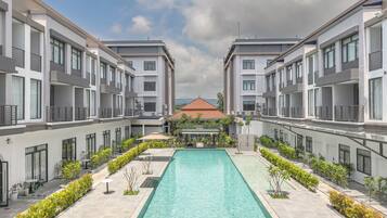 Outdoor pool, open 7:00 AM to 9:00 PM, sun loungers