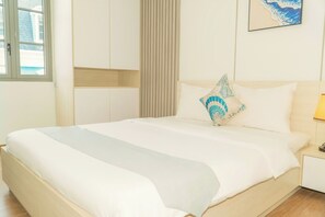 Kamar Double Deluks, pemandangan kota | Minibar, tirai kedap cahaya, Wi-Fi gratis, dan seprai linen