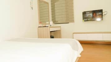 Minibar, cortinas blackout, wifi gratis y ropa de cama