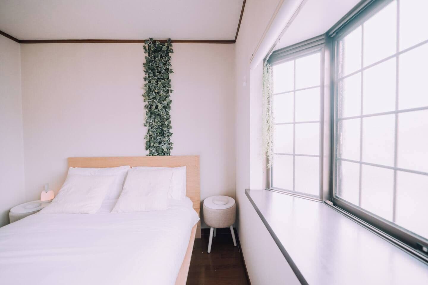 Desk, iron/ironing board, bed sheets