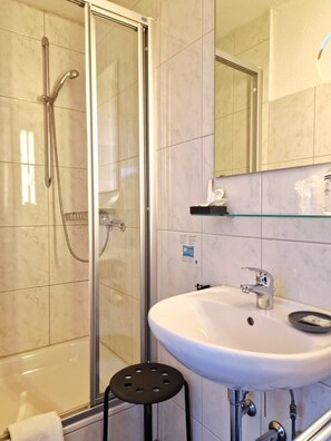 Exclusive Single Room, Private Bathroom | Bathroom | Hair dryer, towels, shampoo, toilet paper