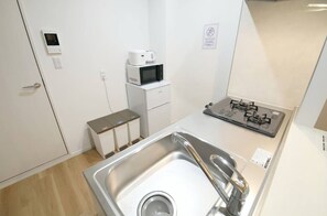 Comfort Apartment, Multiple Beds, Non Smoking, Balcony, 202 | Private kitchen | Fridge, microwave, stovetop, cookware/dishes/utensils