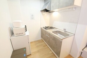 Comfort Apartment, Multiple Beds, Non Smoking, Balcony | Private kitchen | Fridge, microwave, stovetop, cookware/dishes/utensils