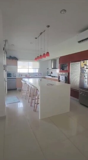 Fridge, oven, toaster, cookware/dishes/utensils