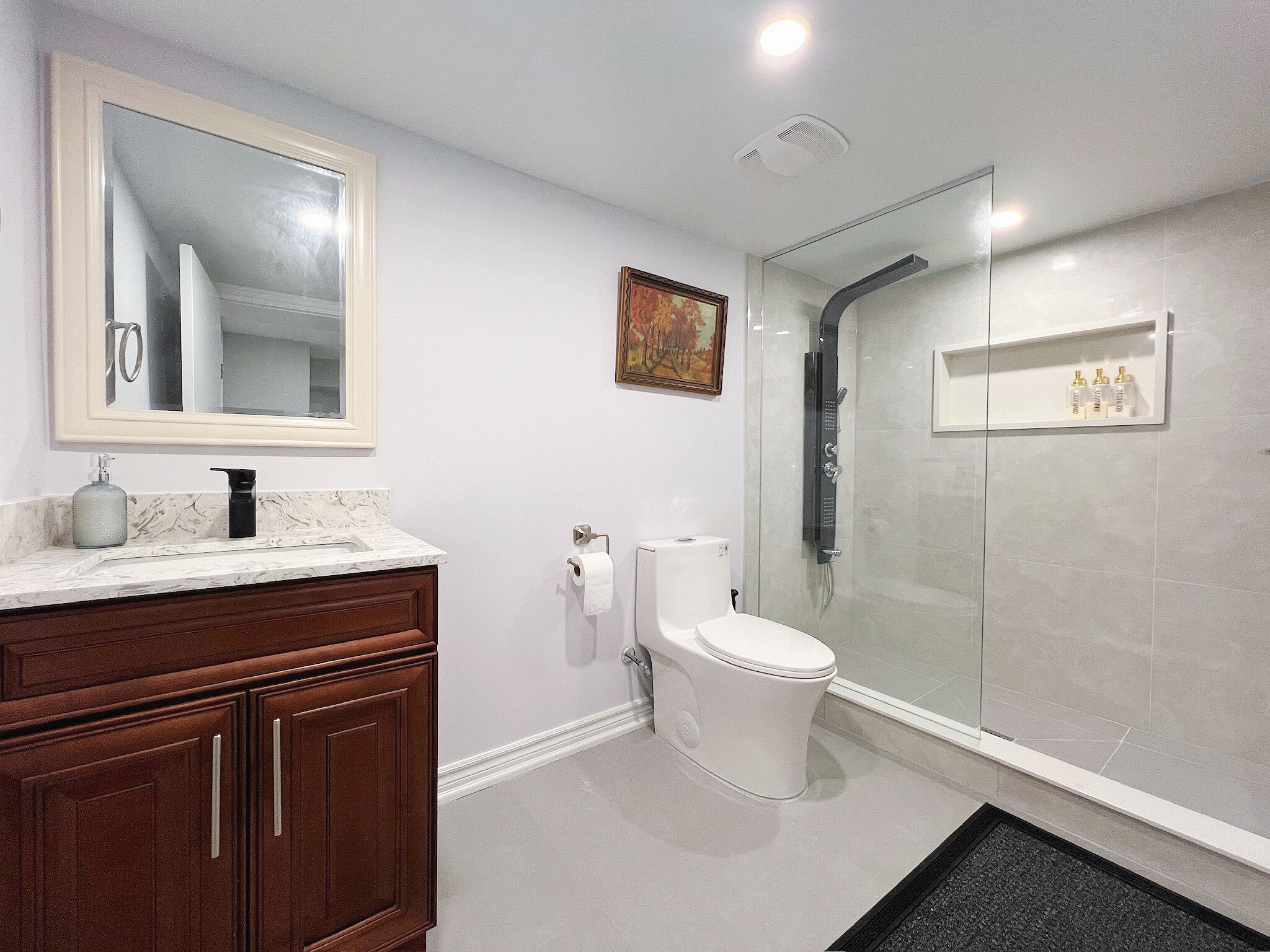 Deluxe Quadruple Room, 2 Double Beds, Private Bathroom | Bathroom | Shower, hydromassage showerhead, hair dryer, towels