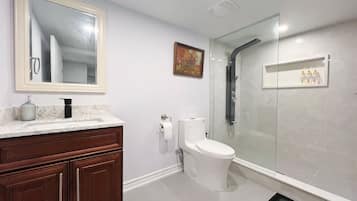 Deluxe Quadruple Room, 2 Double Beds, Private Bathroom | Bathroom | Shower, hydromassage showerhead, hair dryer, towels