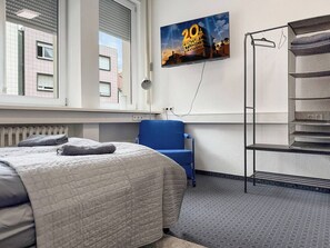 3 habitaciones, tabla de planchar con plancha, wifi y ropa de cama