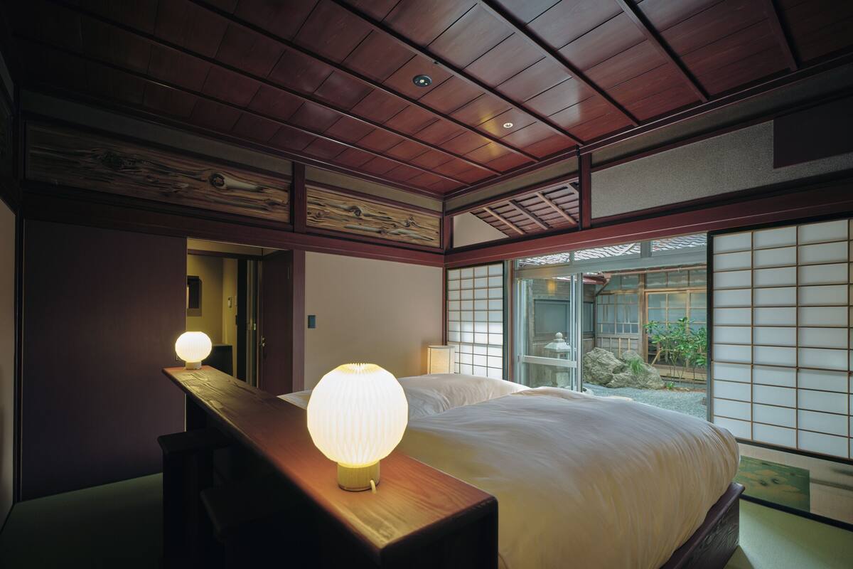 Double Room, Garden View | Minibar (free items), in-room safe, iron/ironing board (on request)