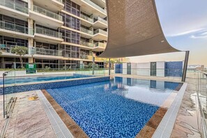 Indoor pool, a heated pool - Modern & Cozy Studio | Golf Course Community (Dubai)