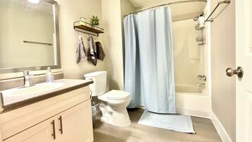 Hair dryer, towels, soap, shampoo