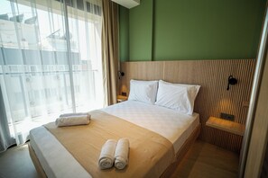 Apartemen Comfort, balkon, pemandangan kota | Wi-Fi gratis
