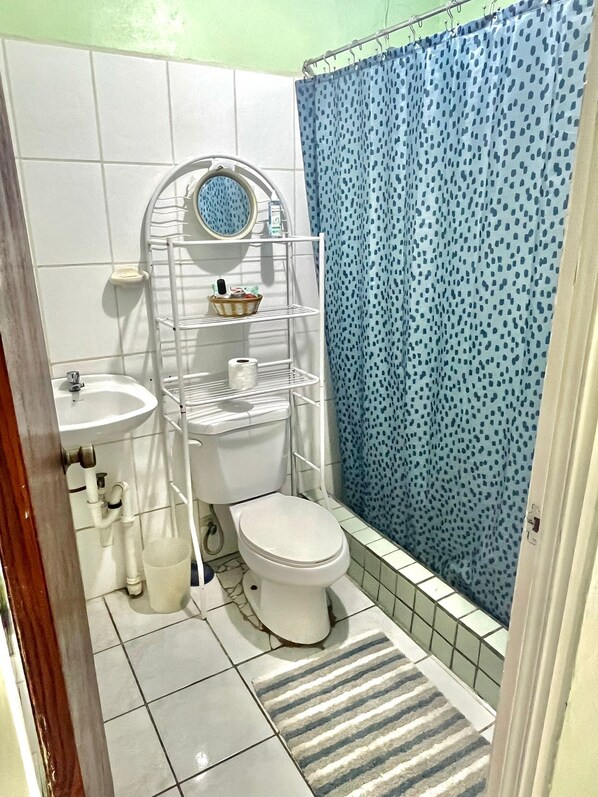 Shower, towels, soap, shampoo