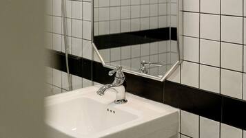 Family Quadruple Room, 2 Queen Beds, City View | Bathroom | Shower, slippers, towels, soap