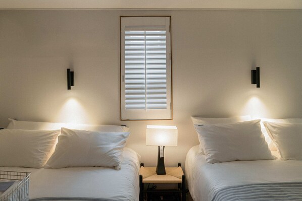 Family Quadruple Room, 2 Queen Beds, City View | Desk, laptop workspace, soundproofing, iron/ironing board - Orly Minbak (Seoul)