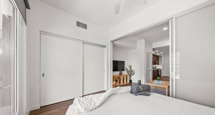 Chic Downtown Stay + Walk to Beach