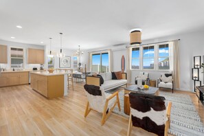 House (3 Bedrooms) | Living area | 43-inch flat-screen TV with cable channels, foosball - @ Marbella Lane - Mesmerizing Ocean + MT Views (Waianae)