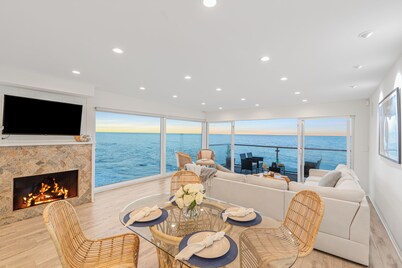 Oceanfront Retreat with Multiple Balconies, Direct Beach Access & Sweeping Views