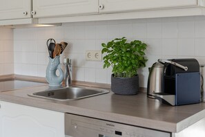 Fridge, dishwasher, coffee/tea maker, electric kettle
