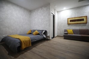 1 dormitorio, tabla de planchar con plancha, wifi gratis y ropa de cama