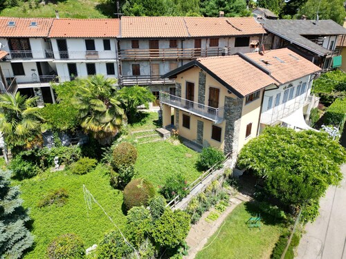 Charming traditional Ameno cottage with private garden, balcony & AC