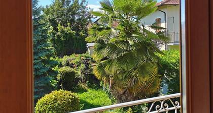 Charming traditional Ameno cottage with private garden, balcony & AC