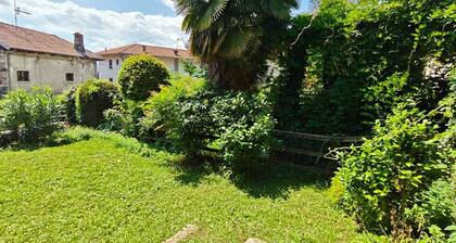 Charming traditional Ameno cottage with private garden, balcony & AC