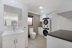 Shower, hair dryer, towels