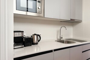 Fridge, microwave, dishwasher, coffee/tea maker