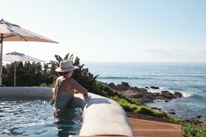 2 outdoor pools, pool umbrellas, pool loungers