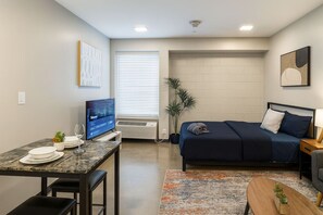 1 bedroom, desk, iron/ironing board, travel cot