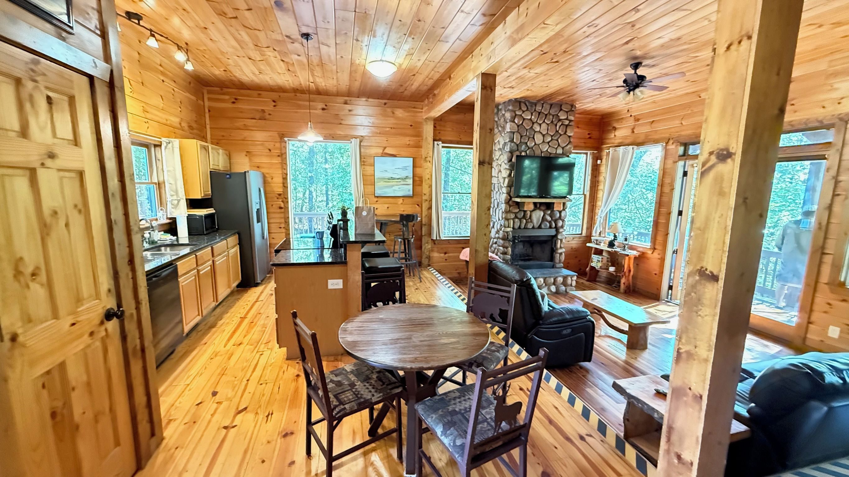 Seating for 4 in photo.  Additional table that sits up to 3. 
Bar area seating 2. 