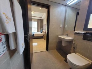 Deluxe Suite, 1 Bedroom | Bathroom | Shower, slippers, towels - Dancenter Jewel Near World Trade Center (Manama)