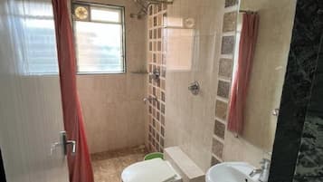 Shower, free toiletries, towels, soap