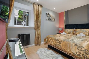 1 bedroom, desk, iron/ironing board, travel cot