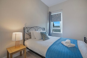 Desk, iron/ironing board, travel cot, free WiFi