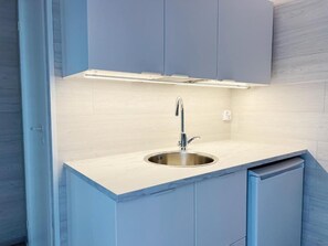 Superior Suite, Lake View, Lakeside | Private kitchen | Mini-fridge, microwave, coffee/tea maker, cookware/dishes/utensils
