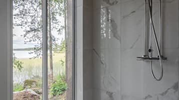 Superior Suite, Lake View, Lakeside | Bathroom | Shower, hair dryer, towels