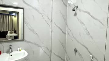 Shower, towels, soap, shampoo
