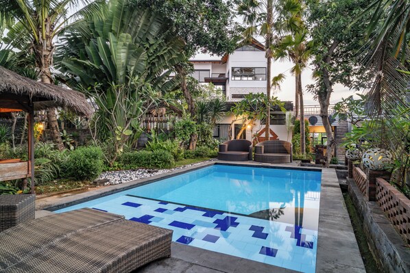 2 outdoor pools, pool umbrellas, pool loungers