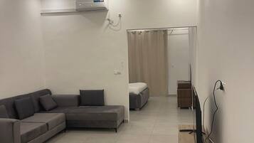 Elite Room | Premium bedding, desk, blackout curtains, iron/ironing board