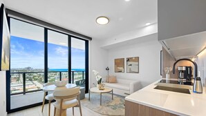 A modern apartment with a balcony, a dining area, a living room, and a kitchen. - NOK Amazing 1 BR in Miami Beach (Miami Beach)