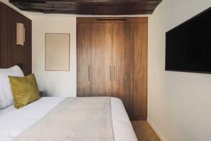 Departamento | 2 habitaciones, tabla de planchar con plancha y ropa de cama
