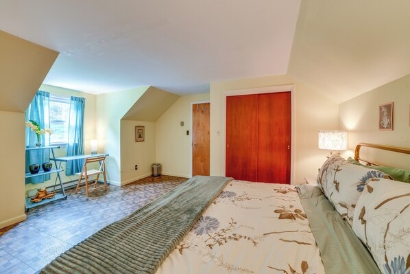 A bedroom with a bed, a desk, and a window with curtains. - Serene Duplex w/ On-site Brook in Callicoon Center (Roscoe)