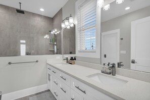 Shower, towels, soap, toilet paper