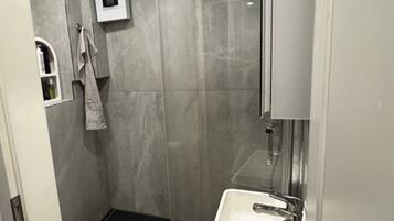 Hair dryer, towels, soap, shampoo