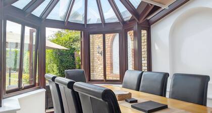 A cottage that sleeps 8 guests in 4 bedrooms