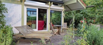 Room with private bathroom and balcony by the canal