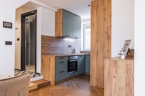Appartement Deluxe, 1 chambre | Cuisine privée | Réfrigérateur grande capacité avec congélateur, un four